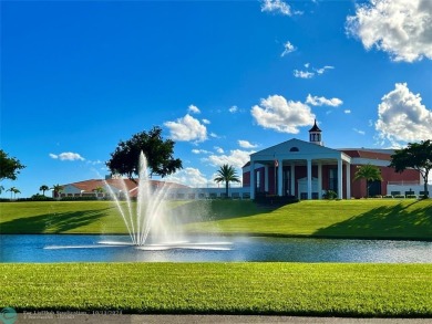 This charming 1 bedroom, 1.5 bathroom residence in Century on Hillsboro Pines Golf in Florida - for sale on GolfHomes.com, golf home, golf lot