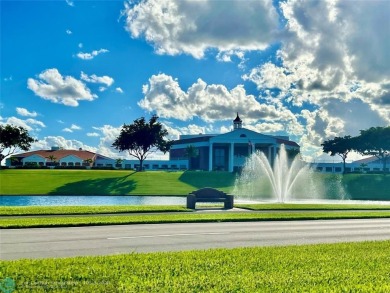 This charming 1 bedroom, 1.5 bathroom residence in Century on Hillsboro Pines Golf in Florida - for sale on GolfHomes.com, golf home, golf lot