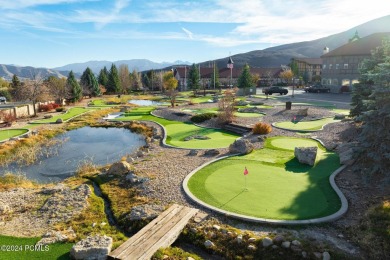 Embrace the charm of alpine living in this elegant second-floor on Homestead Golf Club and Resort in Utah - for sale on GolfHomes.com, golf home, golf lot