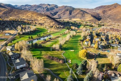 Embrace the charm of alpine living in this elegant second-floor on Homestead Golf Club and Resort in Utah - for sale on GolfHomes.com, golf home, golf lot