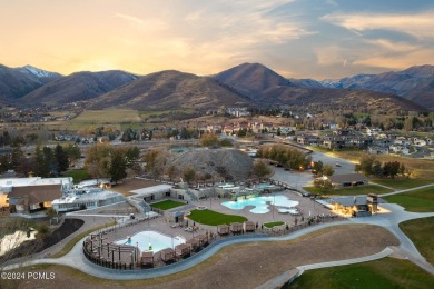 Embrace the charm of alpine living in this elegant second-floor on Homestead Golf Club and Resort in Utah - for sale on GolfHomes.com, golf home, golf lot