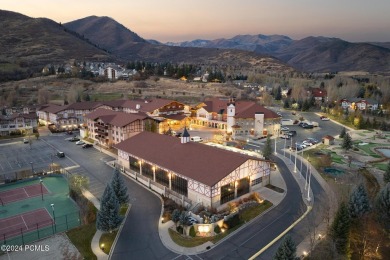 Embrace the charm of alpine living in this elegant second-floor on Homestead Golf Club and Resort in Utah - for sale on GolfHomes.com, golf home, golf lot