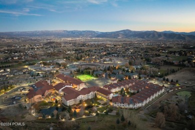 Embrace the charm of alpine living in this elegant second-floor on Homestead Golf Club and Resort in Utah - for sale on GolfHomes.com, golf home, golf lot