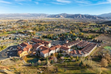 Embrace the charm of alpine living in this elegant second-floor on Homestead Golf Club and Resort in Utah - for sale on GolfHomes.com, golf home, golf lot