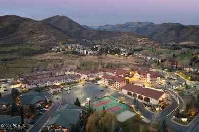 Embrace the charm of alpine living in this elegant second-floor on Homestead Golf Club and Resort in Utah - for sale on GolfHomes.com, golf home, golf lot