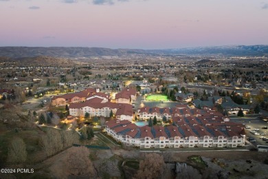 Embrace the charm of alpine living in this elegant second-floor on Homestead Golf Club and Resort in Utah - for sale on GolfHomes.com, golf home, golf lot