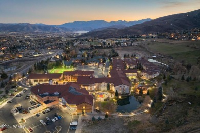 Embrace the charm of alpine living in this elegant second-floor on Homestead Golf Club and Resort in Utah - for sale on GolfHomes.com, golf home, golf lot