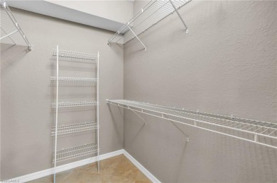 This light and bright first-floor end unit faces east, offering on The Club At Grandezza in Florida - for sale on GolfHomes.com, golf home, golf lot