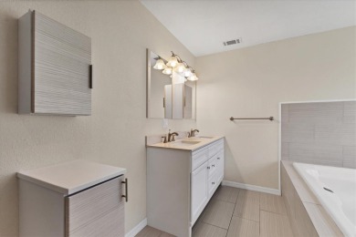 This house was fully updated just a few years ago. This 3 bed 3 on Bobby Jones Golf Club in Florida - for sale on GolfHomes.com, golf home, golf lot