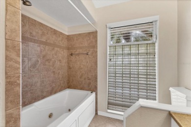 This house was fully updated just a few years ago. This 3 bed 3 on Bobby Jones Golf Club in Florida - for sale on GolfHomes.com, golf home, golf lot