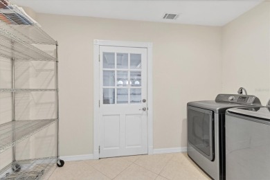 This house was fully updated just a few years ago. This 3 bed 3 on Bobby Jones Golf Club in Florida - for sale on GolfHomes.com, golf home, golf lot