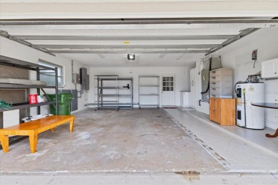 This house was fully updated just a few years ago. This 3 bed 3 on Bobby Jones Golf Club in Florida - for sale on GolfHomes.com, golf home, golf lot