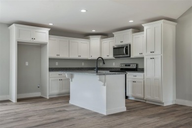 This brand-new construction offers a relaxed and stylish on Russellville Country Club in Kentucky - for sale on GolfHomes.com, golf home, golf lot