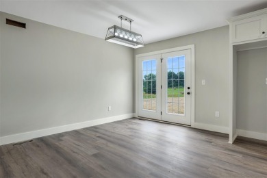 This brand-new construction offers a relaxed and stylish on Russellville Country Club in Kentucky - for sale on GolfHomes.com, golf home, golf lot