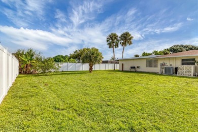 This house was fully updated just a few years ago. This 3 bed 3 on Bobby Jones Golf Club in Florida - for sale on GolfHomes.com, golf home, golf lot