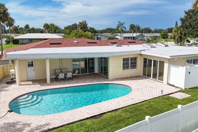 This house was fully updated just a few years ago. This 3 bed 3 on Bobby Jones Golf Club in Florida - for sale on GolfHomes.com, golf home, golf lot