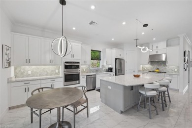 Elegant LAKEFRONT POOL Home on a PRIVATE corner lot in Oyster on The Rookery At Marco in Florida - for sale on GolfHomes.com, golf home, golf lot