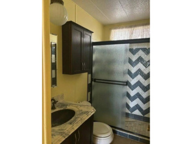 A place to call Home! Come see this two-bedroom, two bathrooms on Colonial Country Club in California - for sale on GolfHomes.com, golf home, golf lot