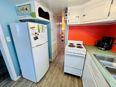 QUAINT 2 BED/2 BATH BEACH HOUSE CENTRALLY LOCATED IN THE HEART on Prestwick Country Club in South Carolina - for sale on GolfHomes.com, golf home, golf lot