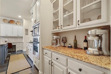 Four bedrooms, 3 full bathrooms, 1 half bathroom and on Lantana Golf Club in Texas - for sale on GolfHomes.com, golf home, golf lot