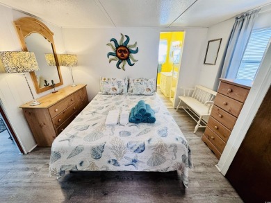 QUAINT 2 BED/2 BATH BEACH HOUSE CENTRALLY LOCATED IN THE HEART on Prestwick Country Club in South Carolina - for sale on GolfHomes.com, golf home, golf lot