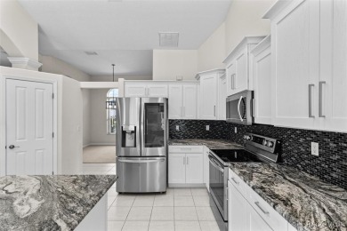 Step into luxury with this stunning 3-bedroom, 2.5-bath home on LakeSide Country Club in Florida - for sale on GolfHomes.com, golf home, golf lot