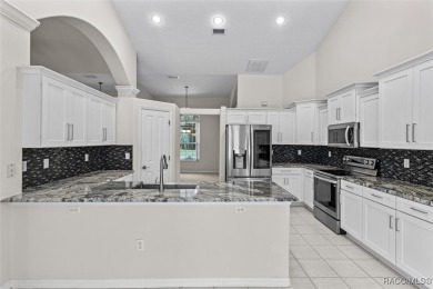Step into luxury with this stunning 3-bedroom, 2.5-bath home on LakeSide Country Club in Florida - for sale on GolfHomes.com, golf home, golf lot