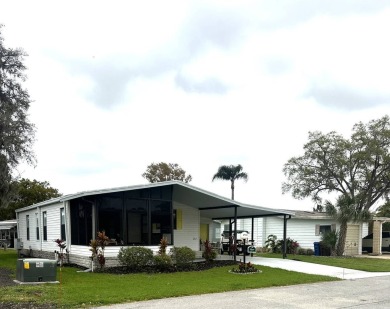 This charming and fully furnished 2-bedroom home is beautifully on Schalamar Creek Golf and Country Club in Florida - for sale on GolfHomes.com, golf home, golf lot