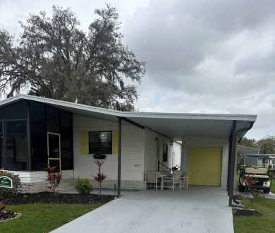 This charming and fully furnished 2-bedroom home is beautifully on Schalamar Creek Golf and Country Club in Florida - for sale on GolfHomes.com, golf home, golf lot