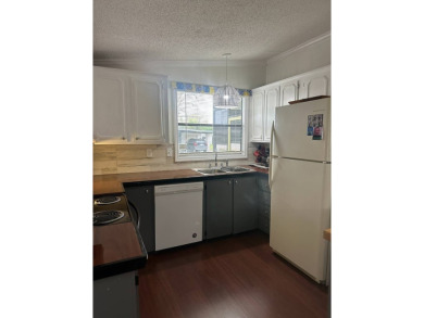 This charming and fully furnished 2-bedroom home is beautifully on Schalamar Creek Golf and Country Club in Florida - for sale on GolfHomes.com, golf home, golf lot