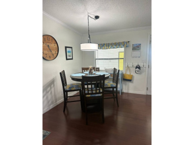 This charming and fully furnished 2-bedroom home is beautifully on Schalamar Creek Golf and Country Club in Florida - for sale on GolfHomes.com, golf home, golf lot