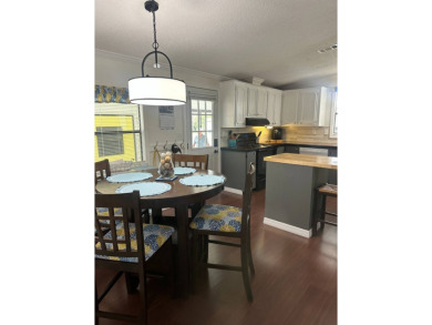 This charming and fully furnished 2-bedroom home is beautifully on Schalamar Creek Golf and Country Club in Florida - for sale on GolfHomes.com, golf home, golf lot
