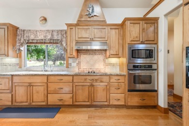 Single level living overlooking 4th fairway at award winning on Aspen Lakes Golf Course in Oregon - for sale on GolfHomes.com, golf home, golf lot