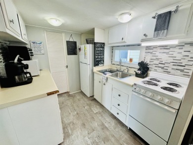 VERY COOL SURF SHACK BEACH HOUSE IN OCEAN LAKES WITH AWESOME on Prestwick Country Club in South Carolina - for sale on GolfHomes.com, golf home, golf lot