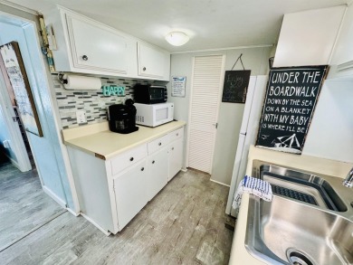 VERY COOL SURF SHACK BEACH HOUSE IN OCEAN LAKES WITH AWESOME on Prestwick Country Club in South Carolina - for sale on GolfHomes.com, golf home, golf lot