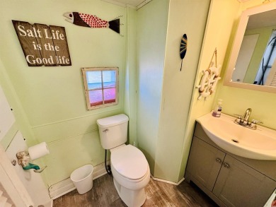 VERY COOL SURF SHACK BEACH HOUSE IN OCEAN LAKES WITH AWESOME on Prestwick Country Club in South Carolina - for sale on GolfHomes.com, golf home, golf lot