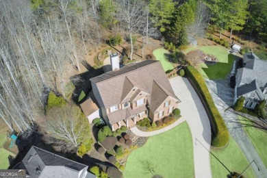 This Exceptional Home in the Prestigious Woodmont Golf & Country on Woodmont Golf and Country Club in Georgia - for sale on GolfHomes.com, golf home, golf lot