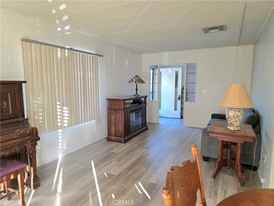 This home is located in a 55 and older private gated community on Bixby Village Golf Course in California - for sale on GolfHomes.com, golf home, golf lot