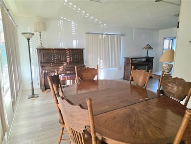 This home is located in a 55 and older private gated community on Bixby Village Golf Course in California - for sale on GolfHomes.com, golf home, golf lot