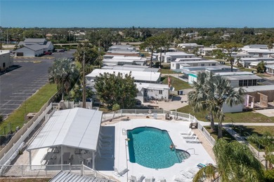 Simplify life with this charming turnkey-furnished mobile home on Boca Royale Golf and Country Club in Florida - for sale on GolfHomes.com, golf home, golf lot
