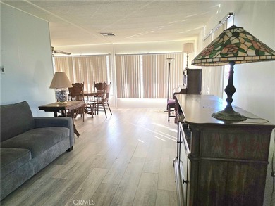 This home is located in a 55 and older private gated community on Bixby Village Golf Course in California - for sale on GolfHomes.com, golf home, golf lot