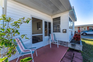 Simplify life with this charming turnkey-furnished mobile home on Boca Royale Golf and Country Club in Florida - for sale on GolfHomes.com, golf home, golf lot