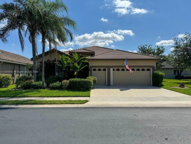 WOW with SOLAR PANELS, this is the one you have been waiting for on Woodmont Country Club in Florida - for sale on GolfHomes.com, golf home, golf lot