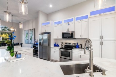 TOTALLY TOTALLY UPDATED A MUST SEE! TRANQUIL COURTYARD HEATED on Wycliffe Golf and Country Club in Florida - for sale on GolfHomes.com, golf home, golf lot