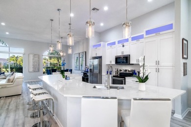 TOTALLY TOTALLY UPDATED A MUST SEE! TRANQUIL COURTYARD HEATED on Wycliffe Golf and Country Club in Florida - for sale on GolfHomes.com, golf home, golf lot