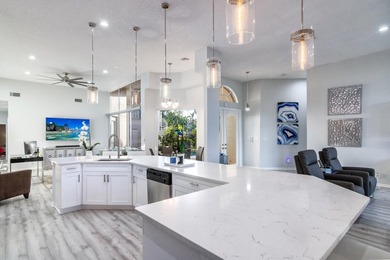 TOTALLY TOTALLY UPDATED A MUST SEE! TRANQUIL COURTYARD HEATED on Wycliffe Golf and Country Club in Florida - for sale on GolfHomes.com, golf home, golf lot