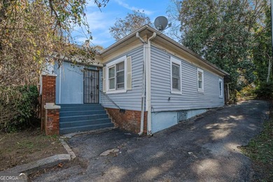 Sold as-is, this investor-friendly ranch home presents a rare on John A. White Golf Course in Georgia - for sale on GolfHomes.com, golf home, golf lot