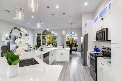 TOTALLY TOTALLY UPDATED A MUST SEE! TRANQUIL COURTYARD HEATED on Wycliffe Golf and Country Club in Florida - for sale on GolfHomes.com, golf home, golf lot