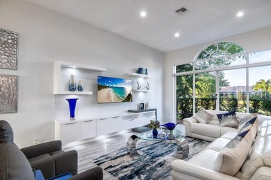 TOTALLY TOTALLY UPDATED A MUST SEE! TRANQUIL COURTYARD HEATED on Wycliffe Golf and Country Club in Florida - for sale on GolfHomes.com, golf home, golf lot