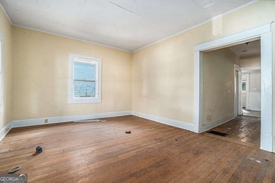 Sold as-is, this investor-friendly ranch home presents a rare on John A. White Golf Course in Georgia - for sale on GolfHomes.com, golf home, golf lot